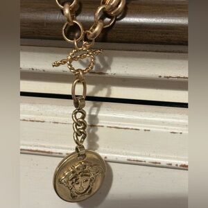 Versace large pendant genuine made in Italy -added non Versace chain.